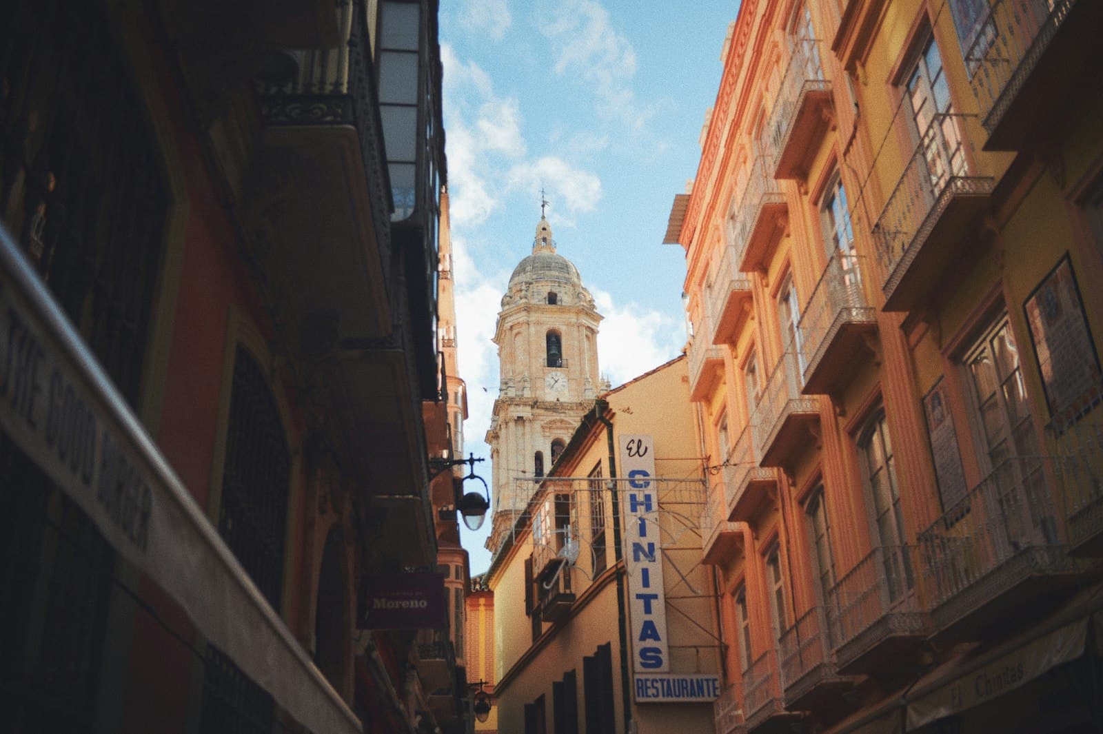 Málaga — white and brown concrete building under blue sky during daytime