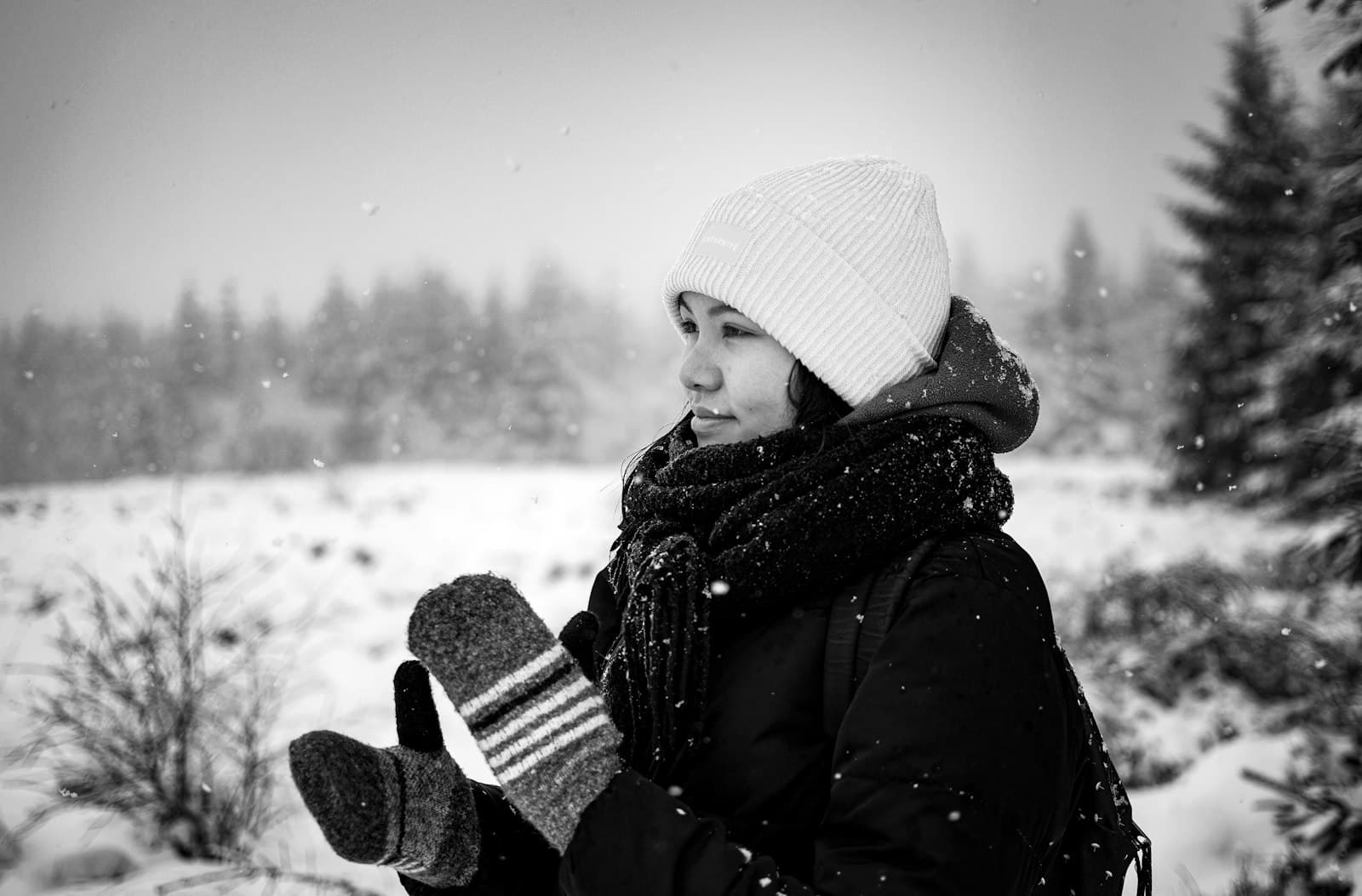 Malmedy — a person holding a baby in the snow
