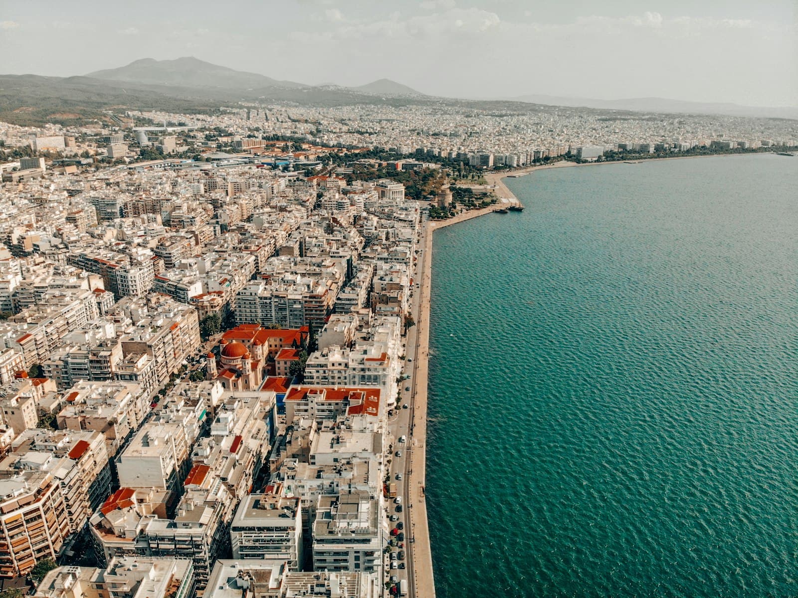 Marathon — an aerial view of a city next to a body of water
