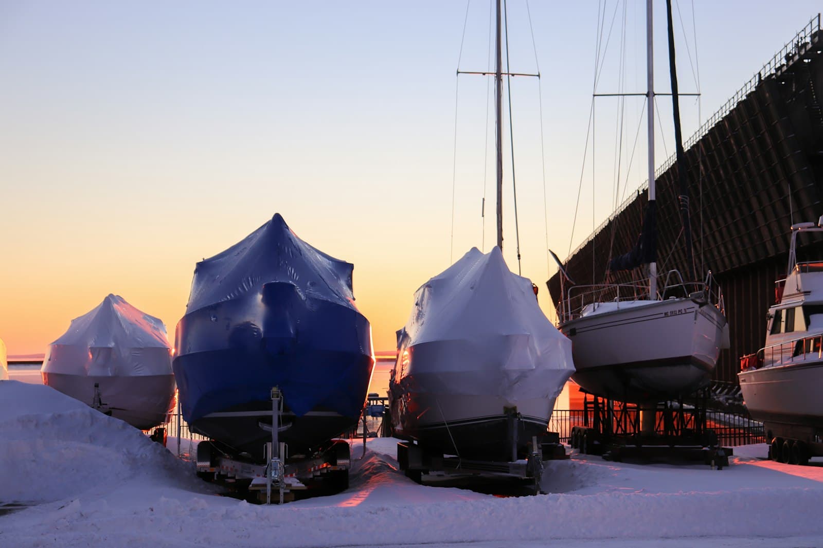 Marquette — a couple of boats that are sitting in the snow