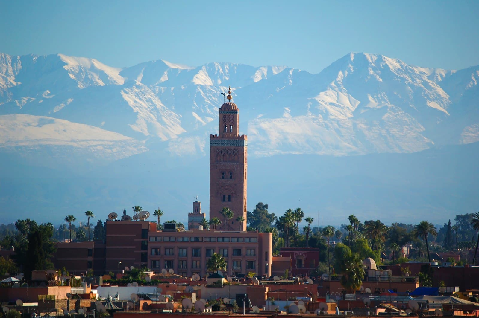 Marrakesh — brown concrete building near mountain during daytime