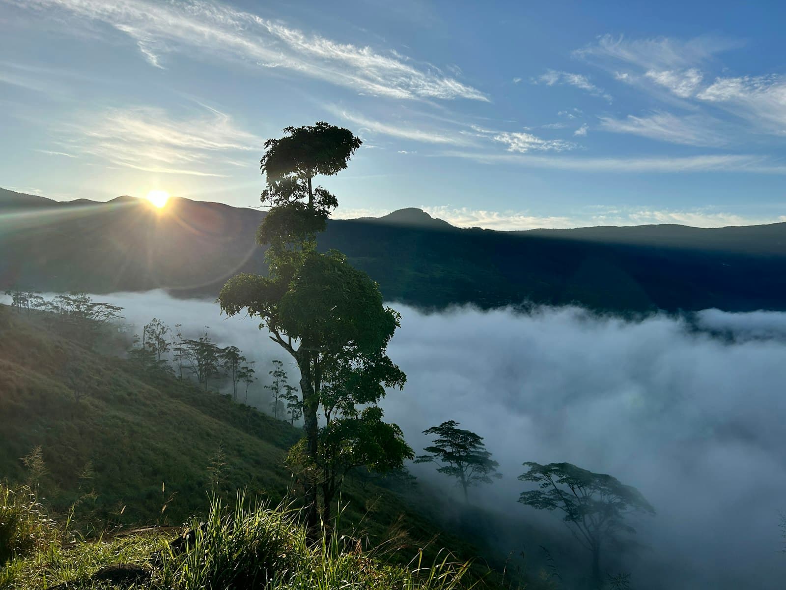 Matale — the sun shines through the clouds in the mountains