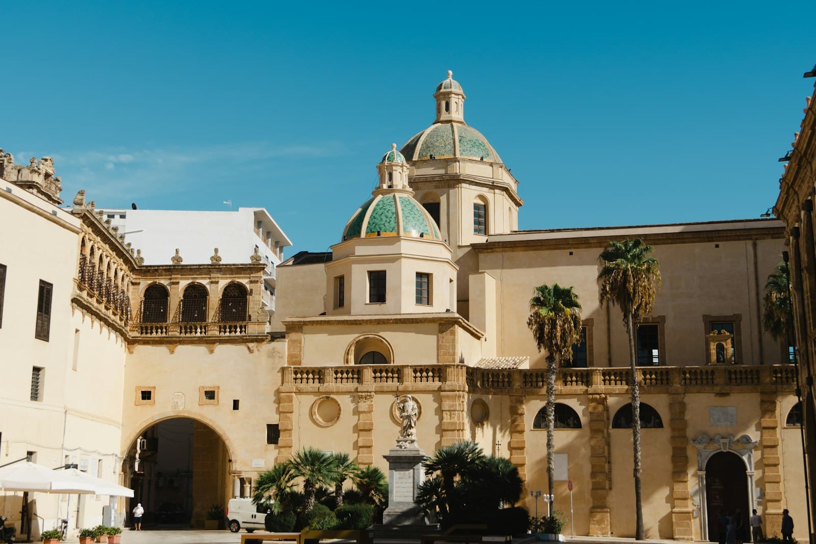 Mazara del Vallo — A large building with a fountain in front of it