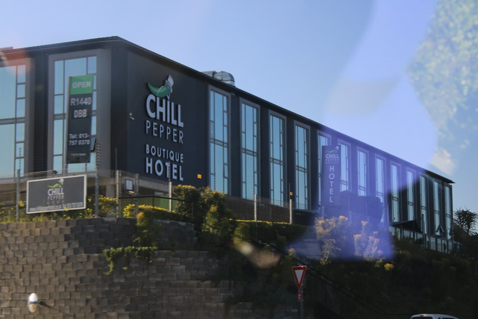 Mbombela — a building with a sign on the side of it