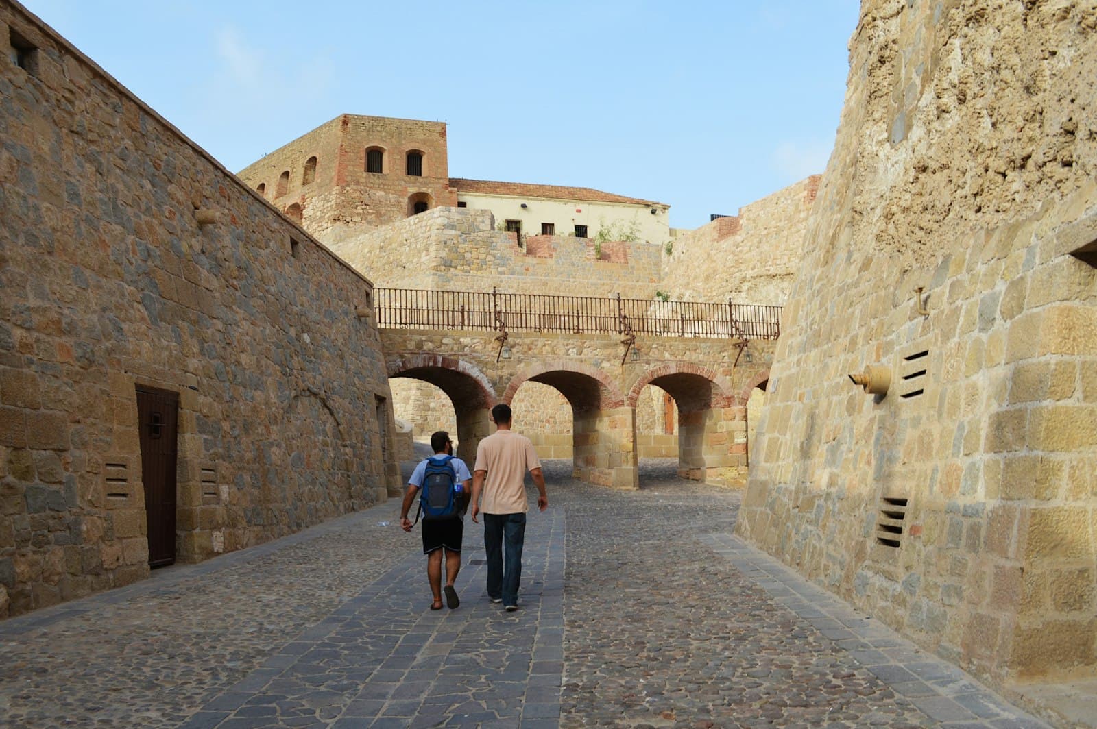 Melilla — people walking on gray concrete pathway during daytime