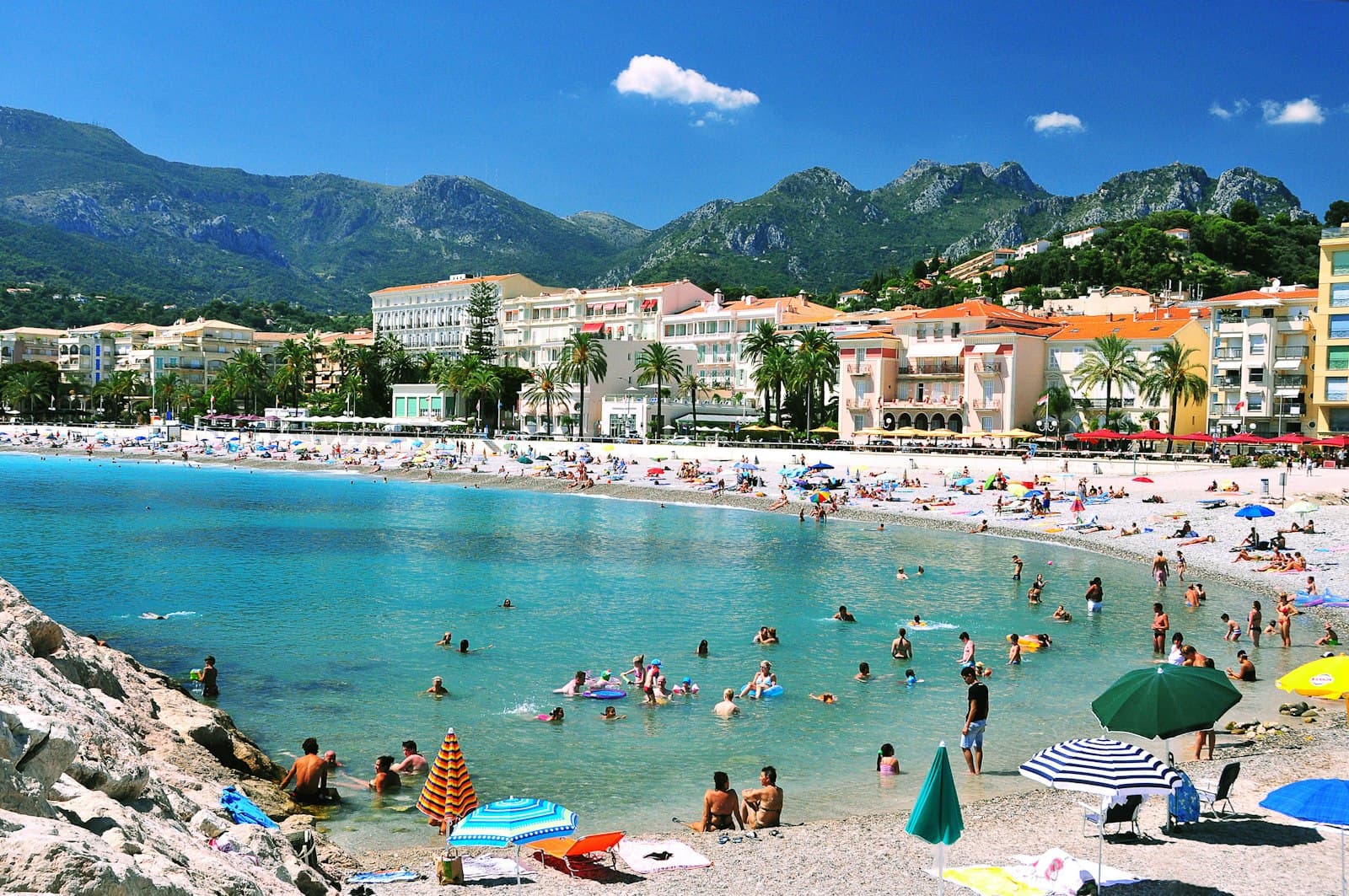 Menton — many people are on the beach and in the water