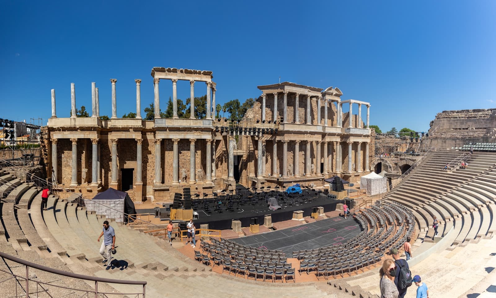Mérida — a group of people standing in front of an old theater