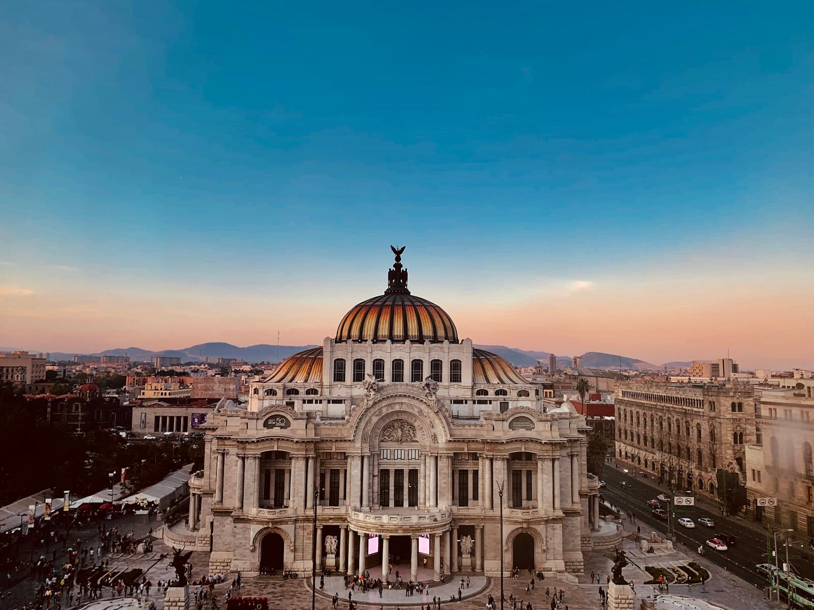 Mexico City — aerial photo of dome building under blue sky at daytime