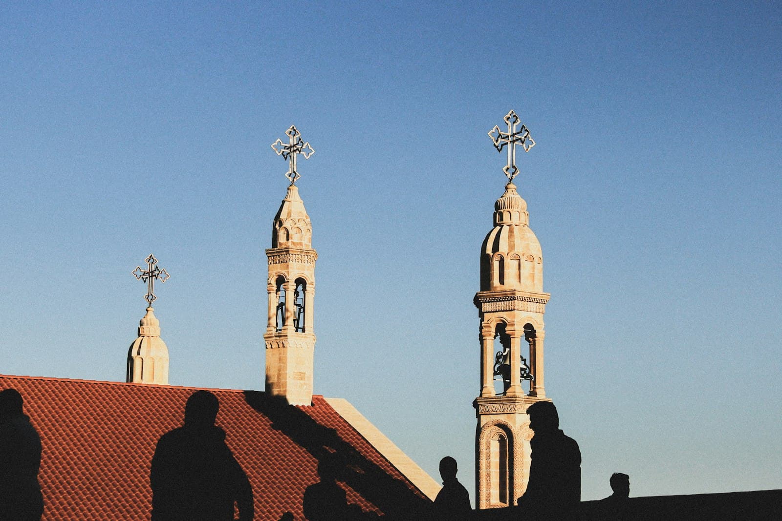 Midyat — a building with a tower and a cross on top
