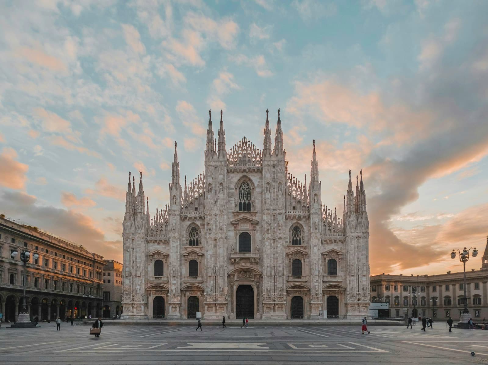 Milan — people walking near brown concrete building during daytime
