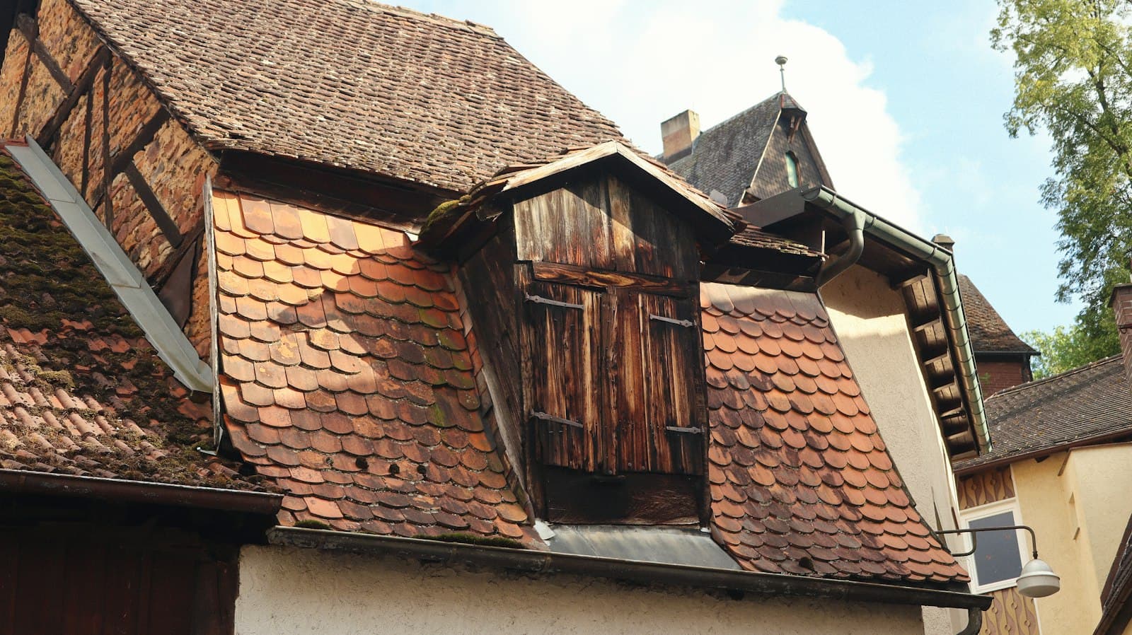 Miltenberg — a building with a red tiled roof and wooden shutters