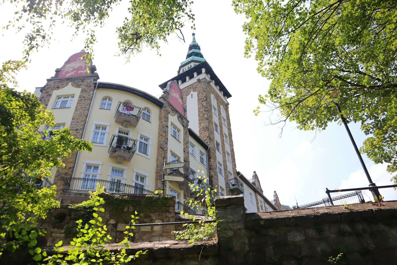 Miskolc — a tall building with a clock on the top of it