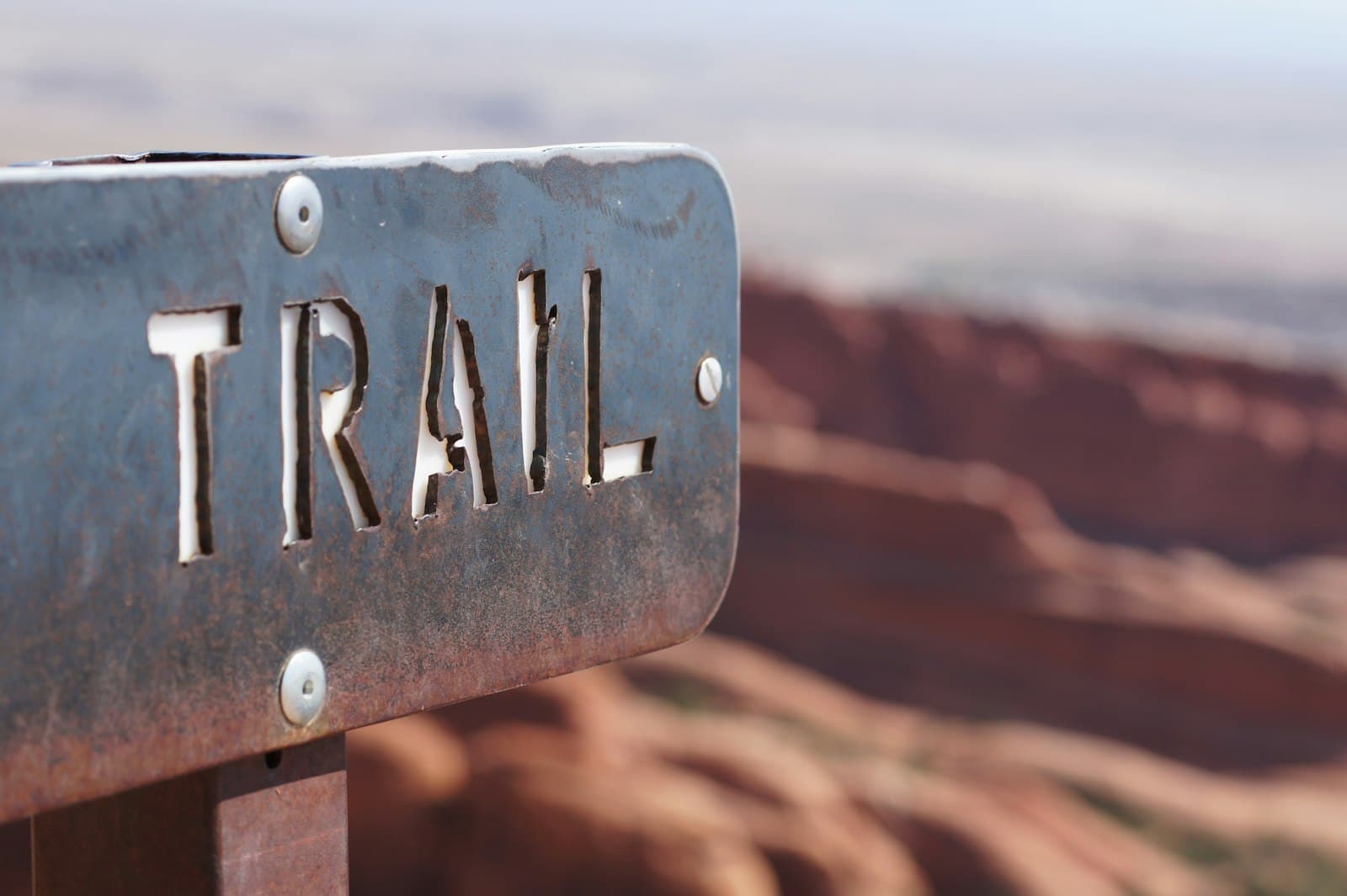 Moab — trail signage selective focus photography