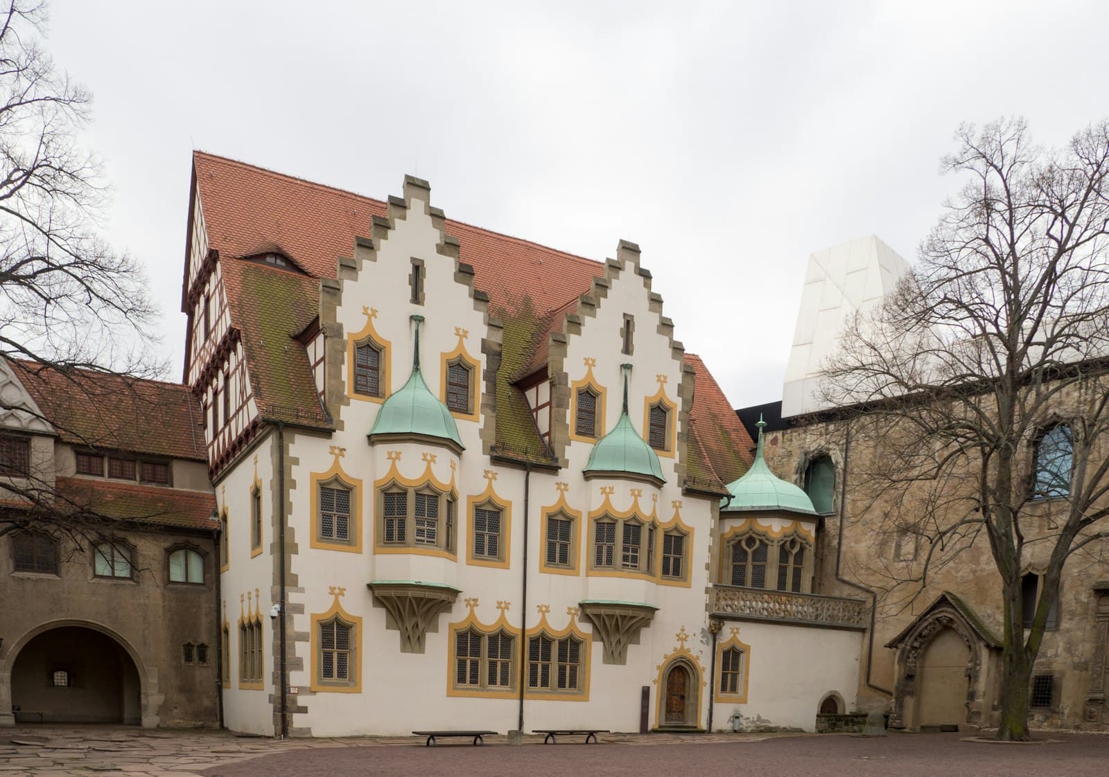 Moritzburg — brown and white concrete building under white sky during daytime
