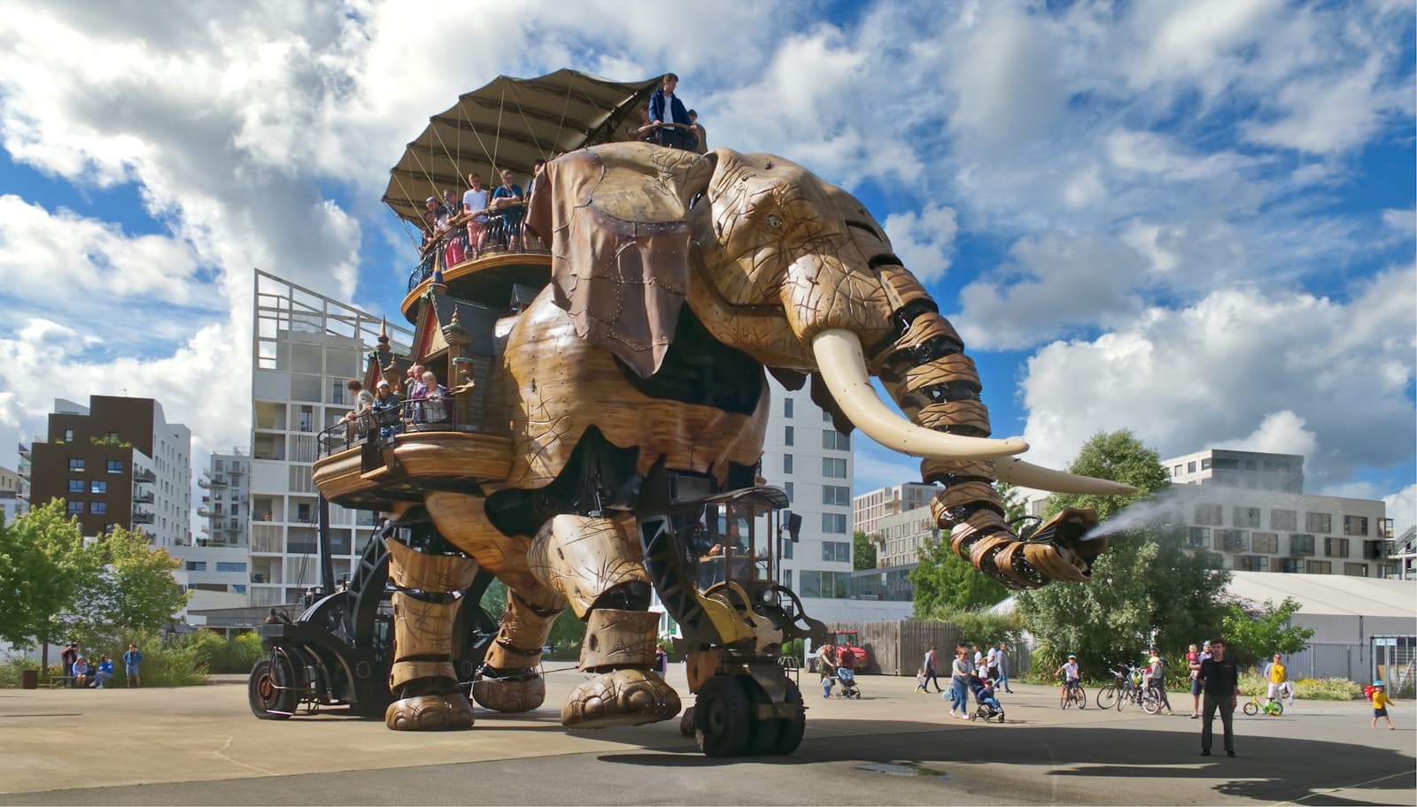 Nantes — a giant mechanical elephant with people riding on it's back