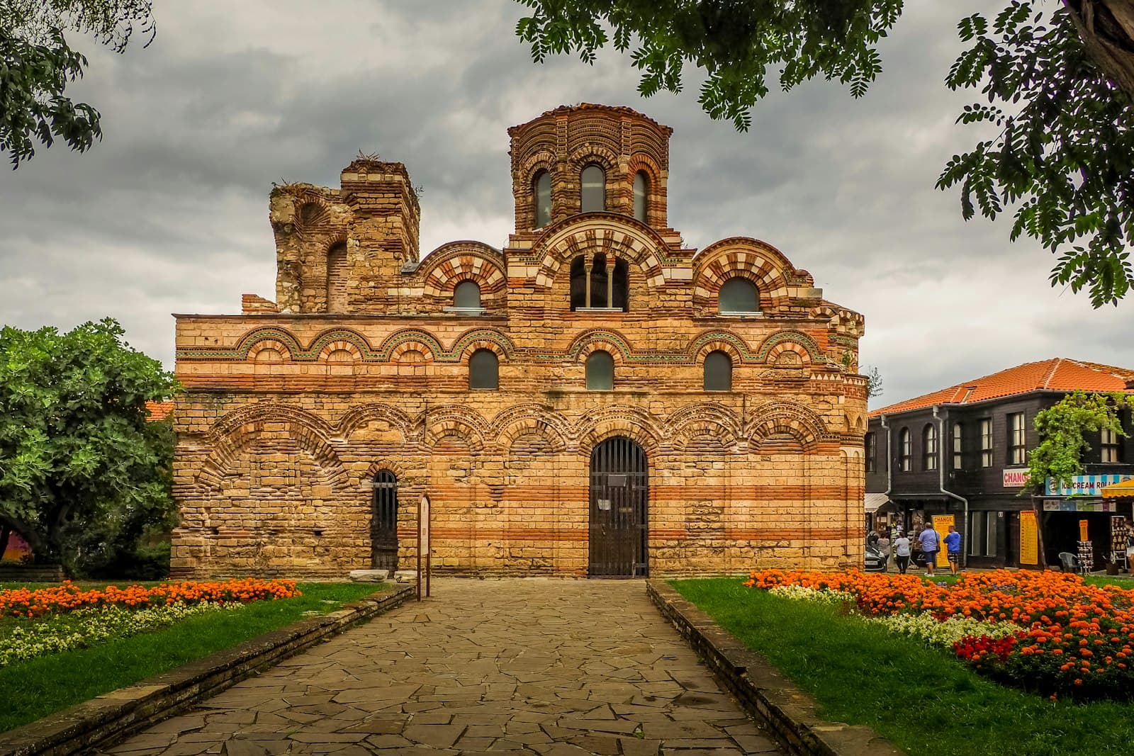 Nessebar — a large brick building with a clock tower on top of it