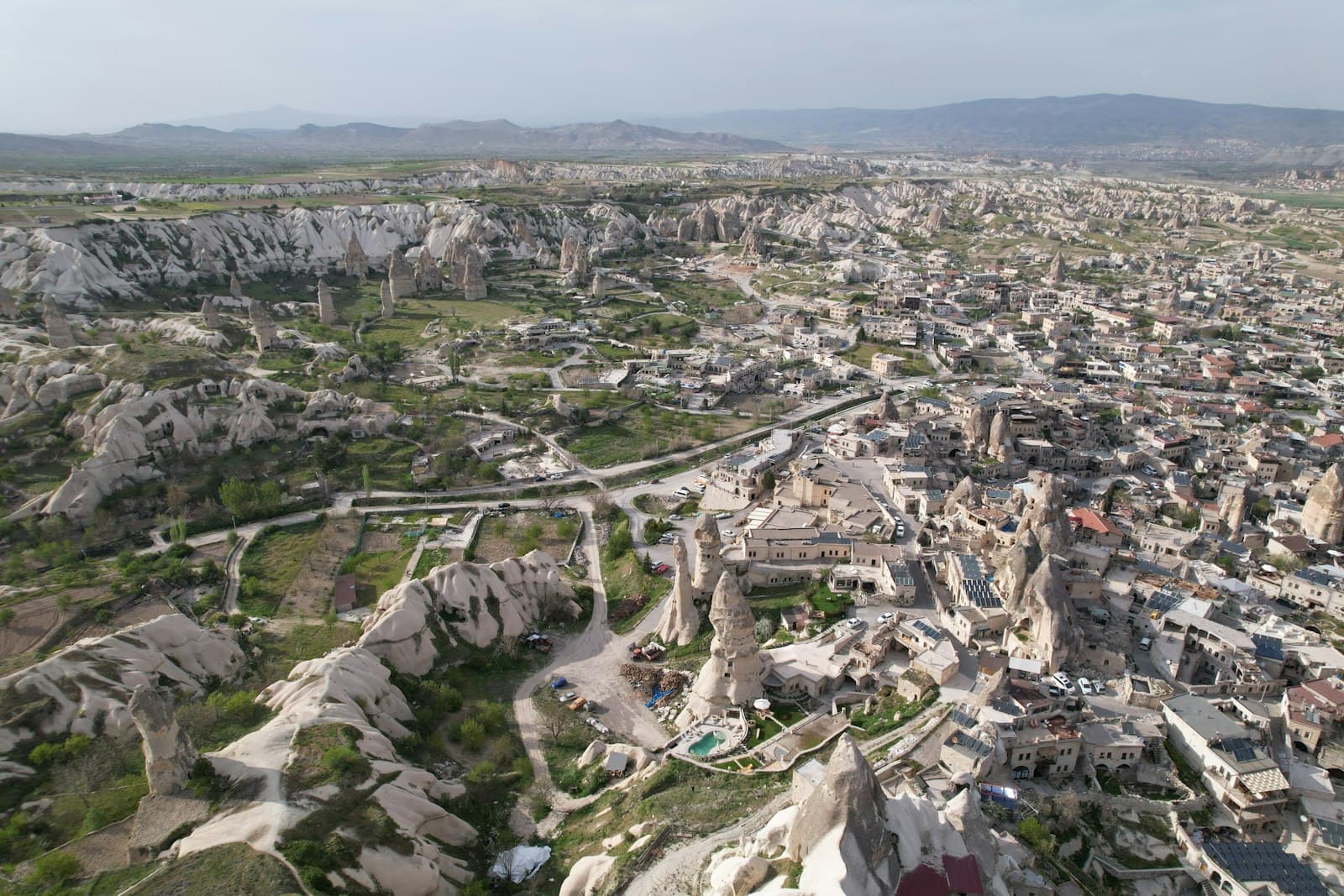 Nevşehir — a bird's eye view of a city with mountains in the background