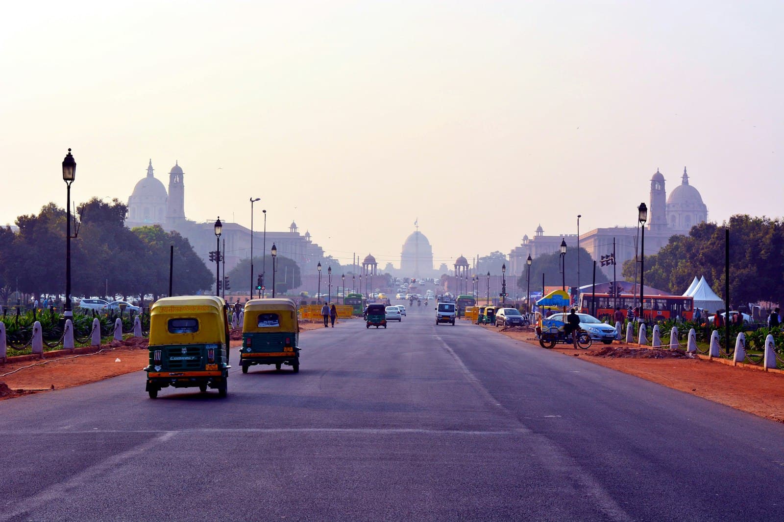 New Delhi — yellow bus on road during daytime