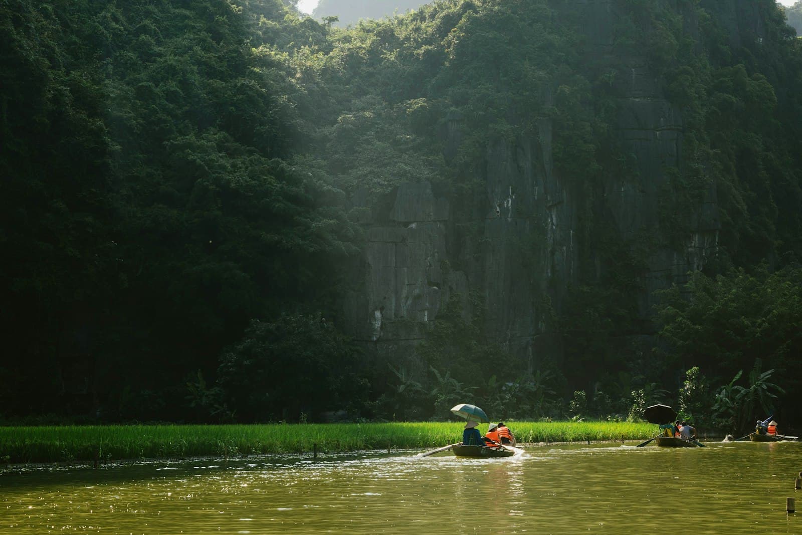Ninh Bình — a group of people in a boat on a river