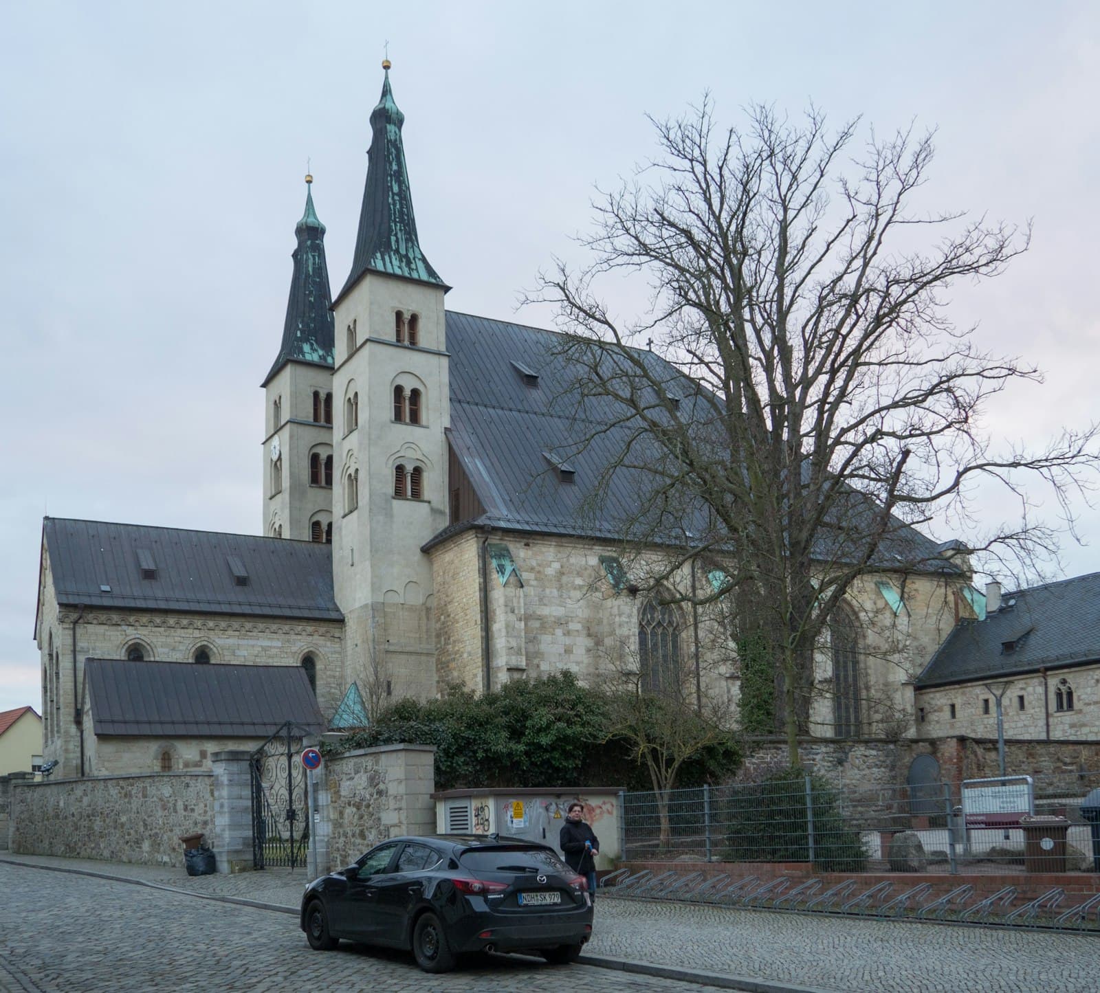 Nordhausen — black car parked beside gray concrete building during daytime