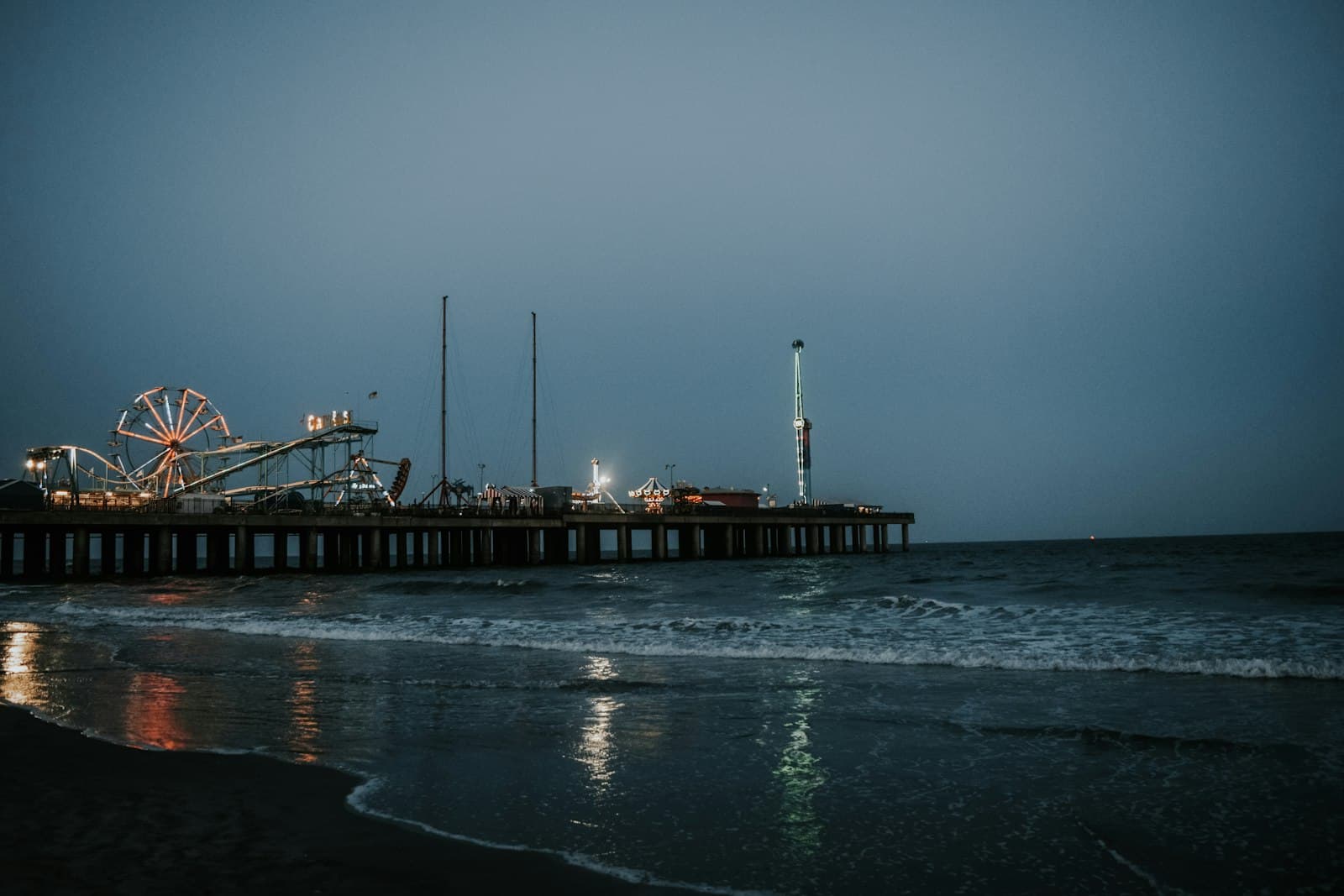Ocean City — a pier with a ferris wheel and a ferris wheel in the distance