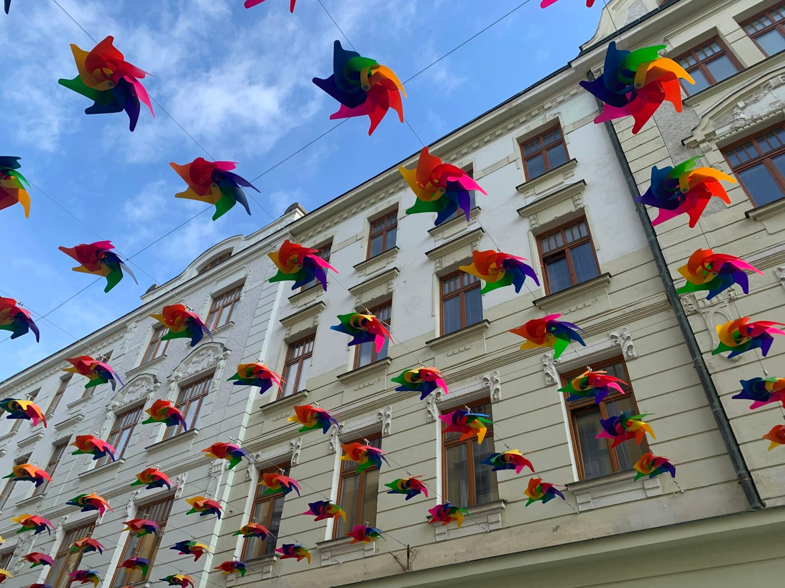 Olomouc — a bunch of colorful kites are flying in the air