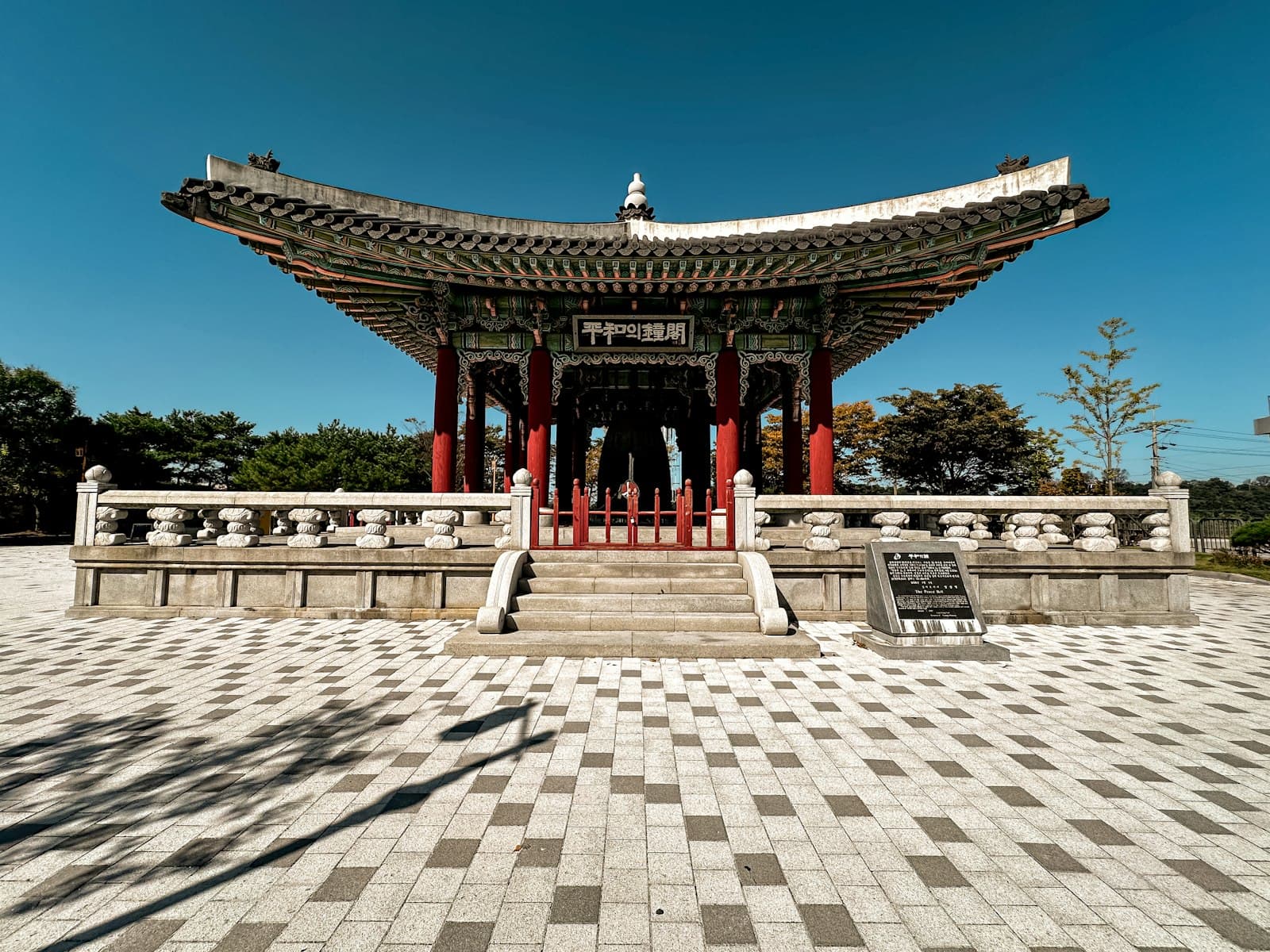 Paju — a building with a checkered floor and a tower in the background