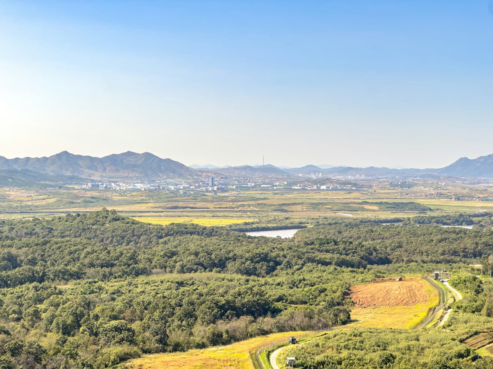 Paju — a scenic view of a valley with a river running through it