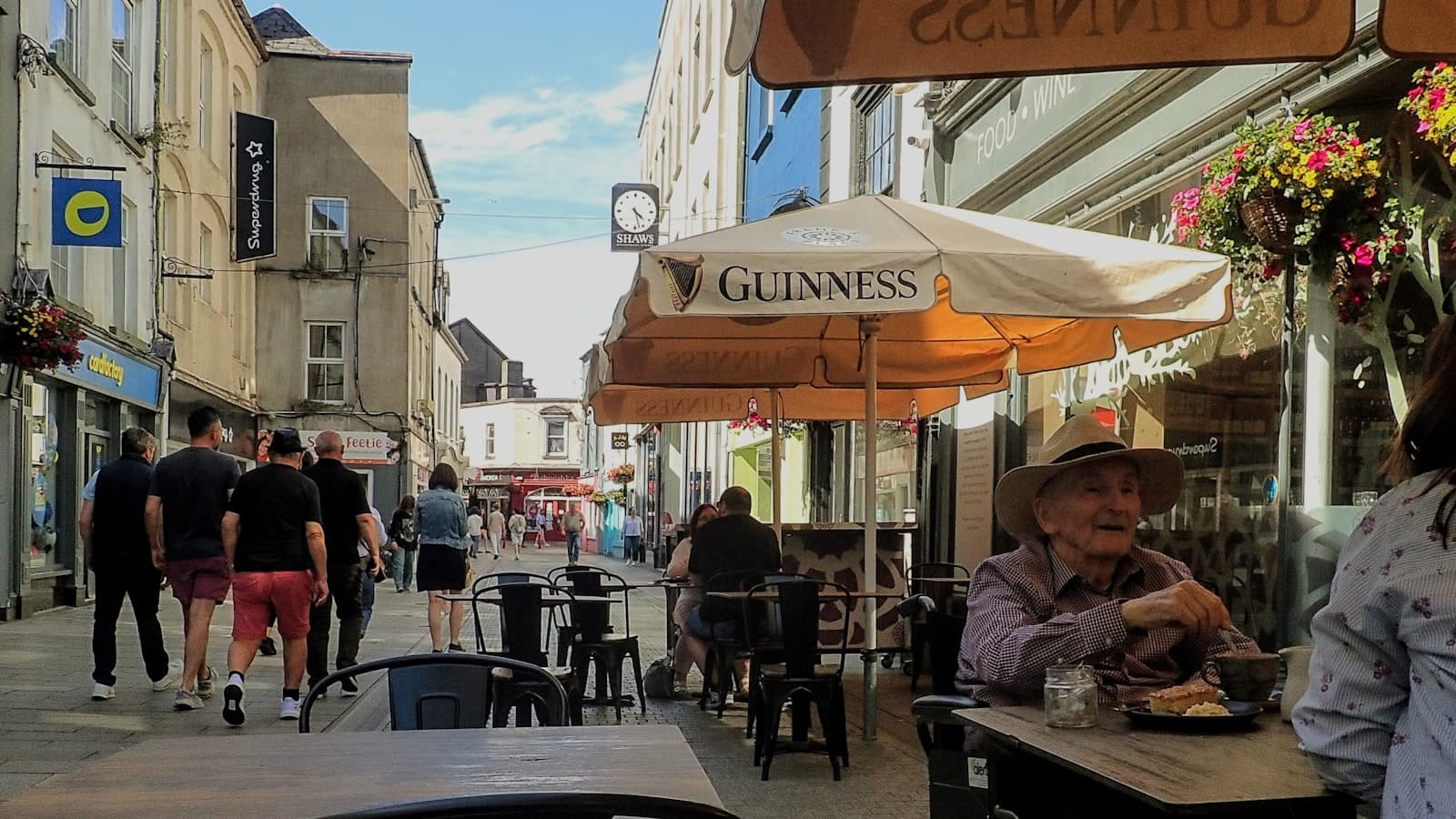 Panama (centre) — Bustling street scene with outdoor cafe and pedestrians.