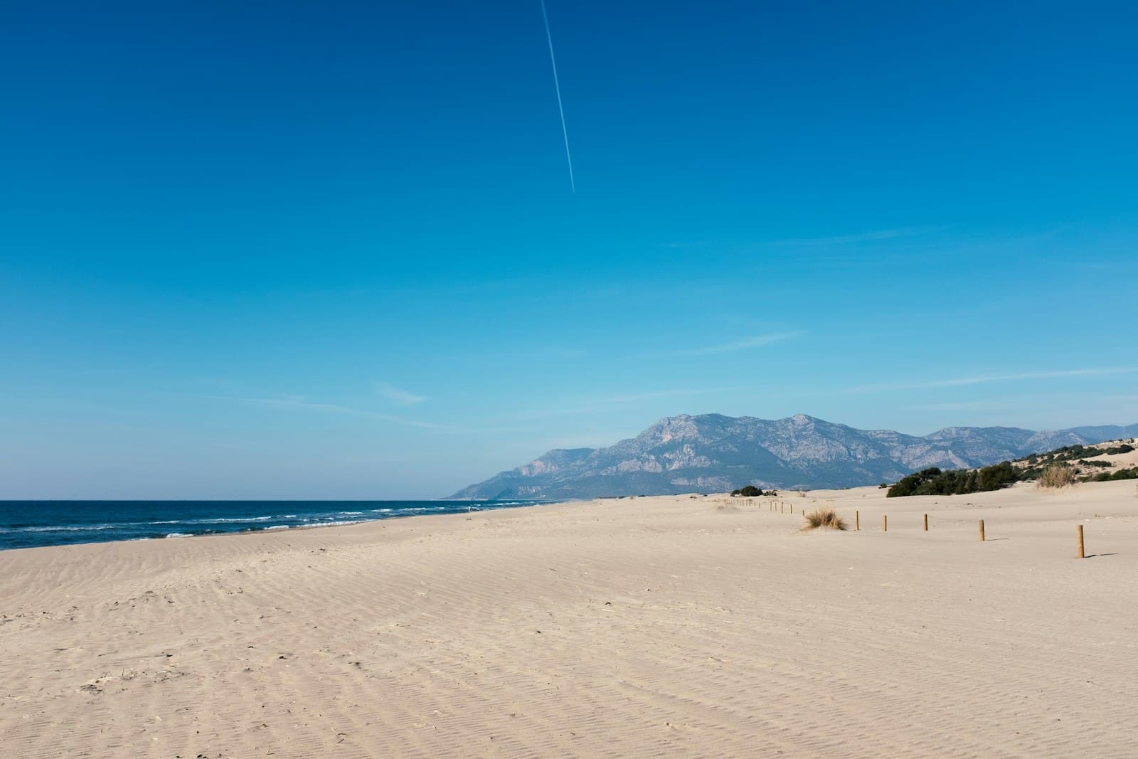 Patara — a sandy beach with mountains in the background