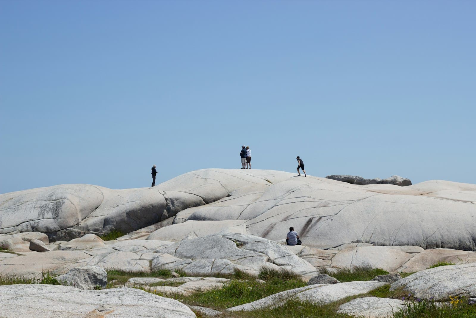 Peggy's Cove — A group of people standing on top of a rocky hill
