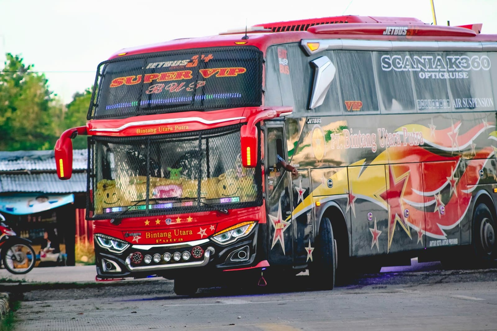 Pekanbaru — red and yellow bus on road during daytime