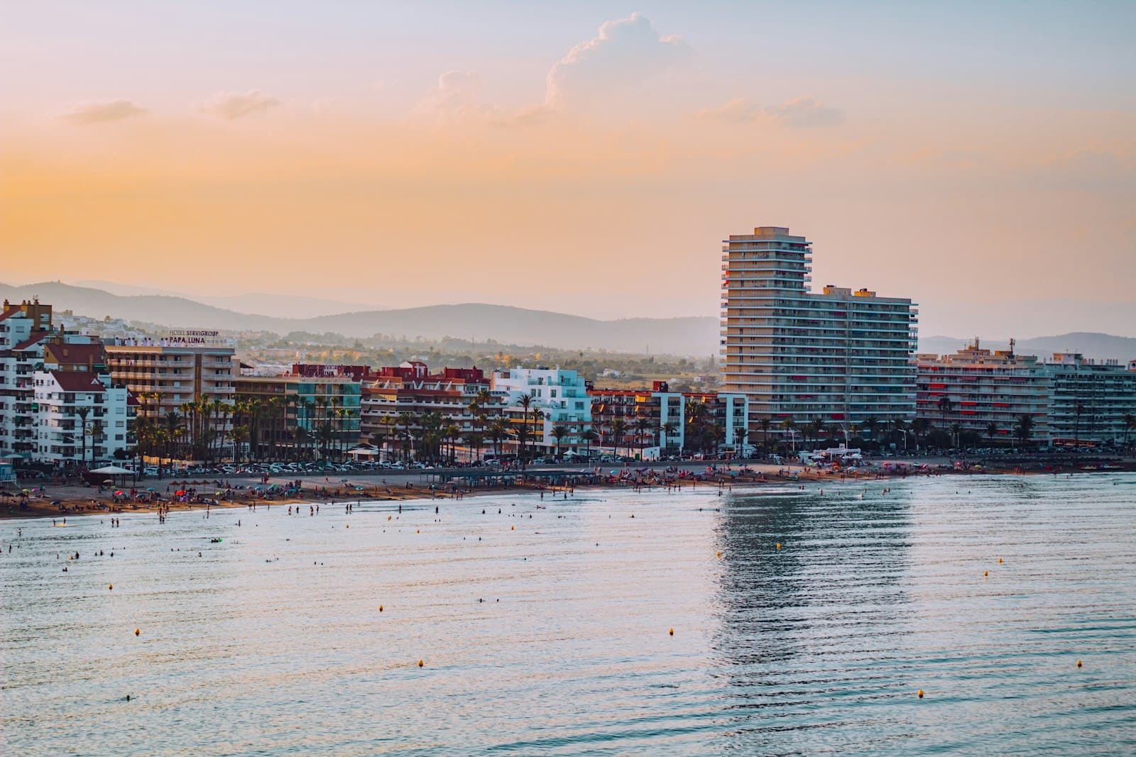 Peñíscola — a body of water with buildings in the background
