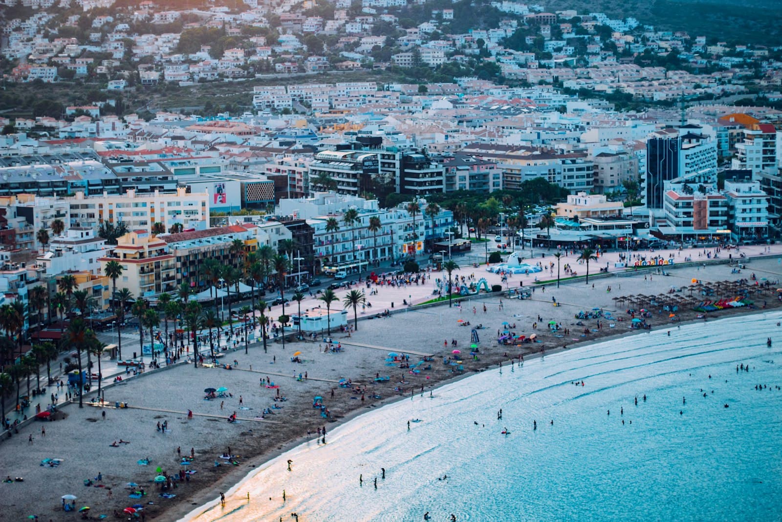 Peñíscola — an aerial view of a beach with a city in the background