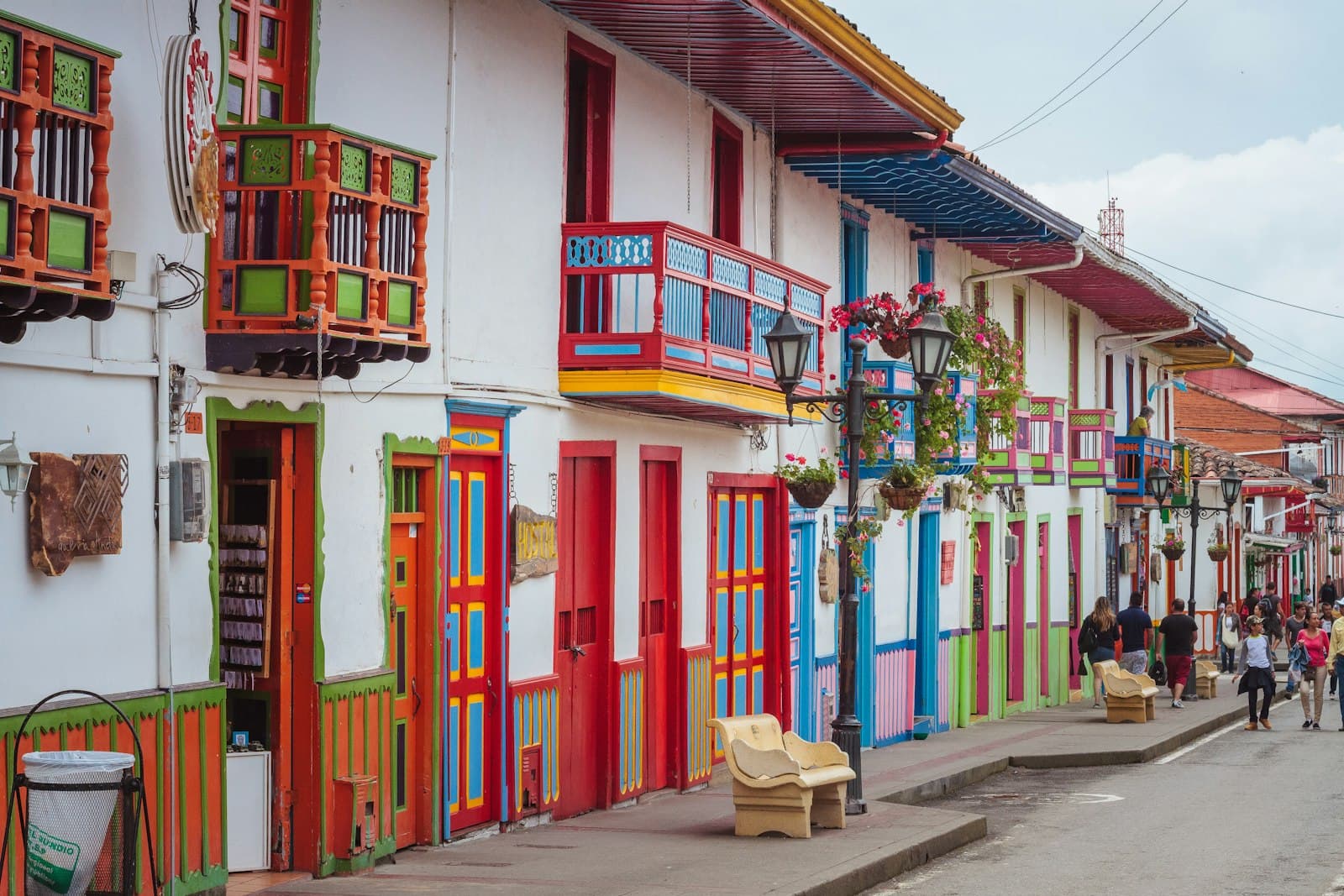 Pereira — people walking on street beside white structure