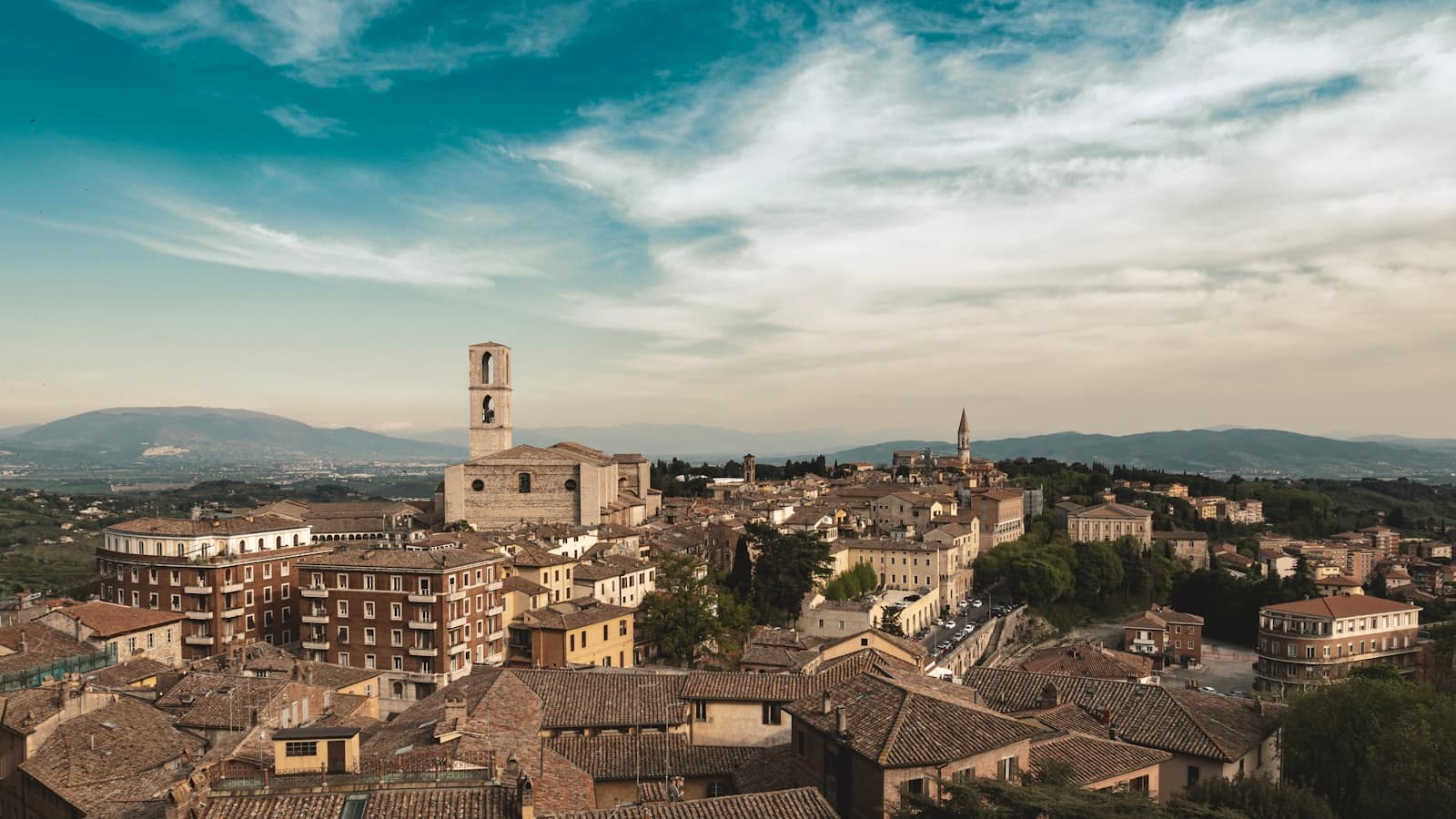Perugia — brown concrete building under blue sky during daytime