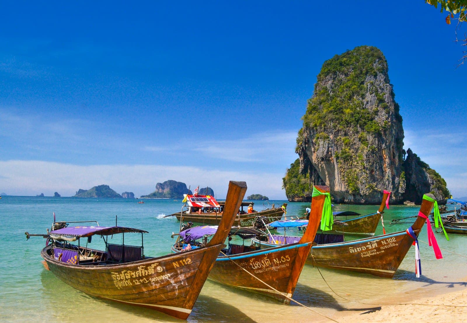 Phitsanulok — five brown wooden boats