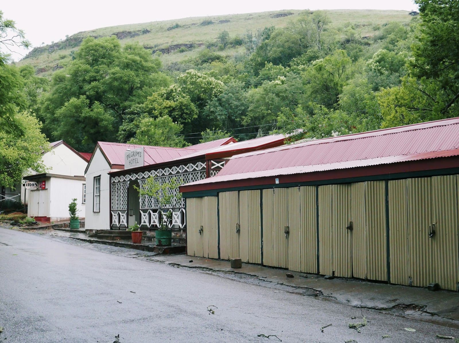 Pilgrim's Rest — a row of buildings sitting on the side of a road
