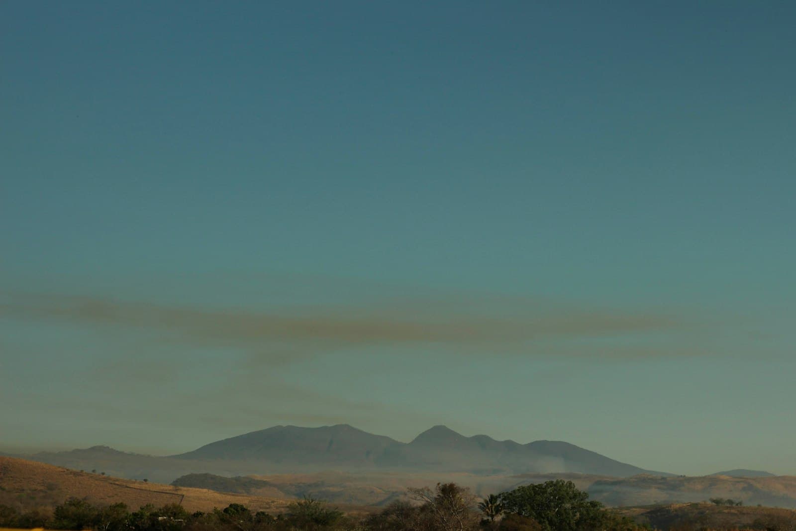 Pinos — a landscape with hills and trees