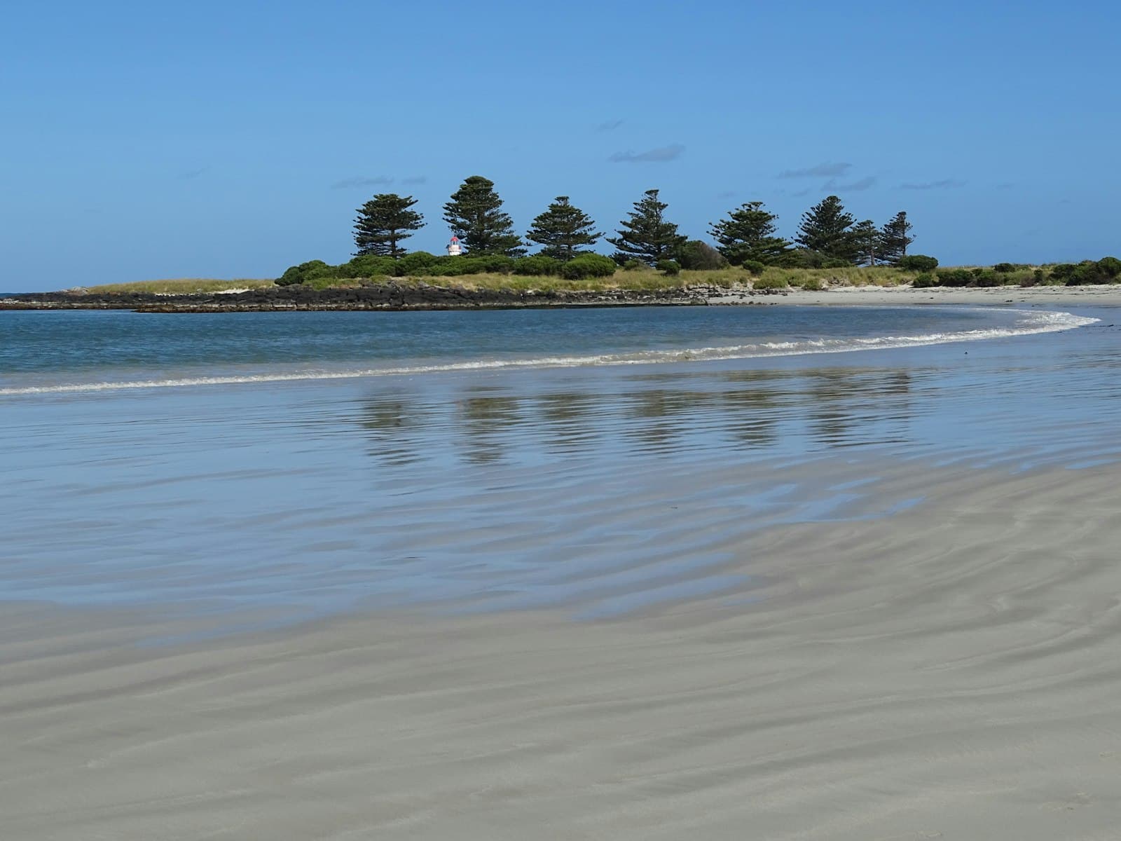 Port Fairy — a sandy beach with a small island in the distance