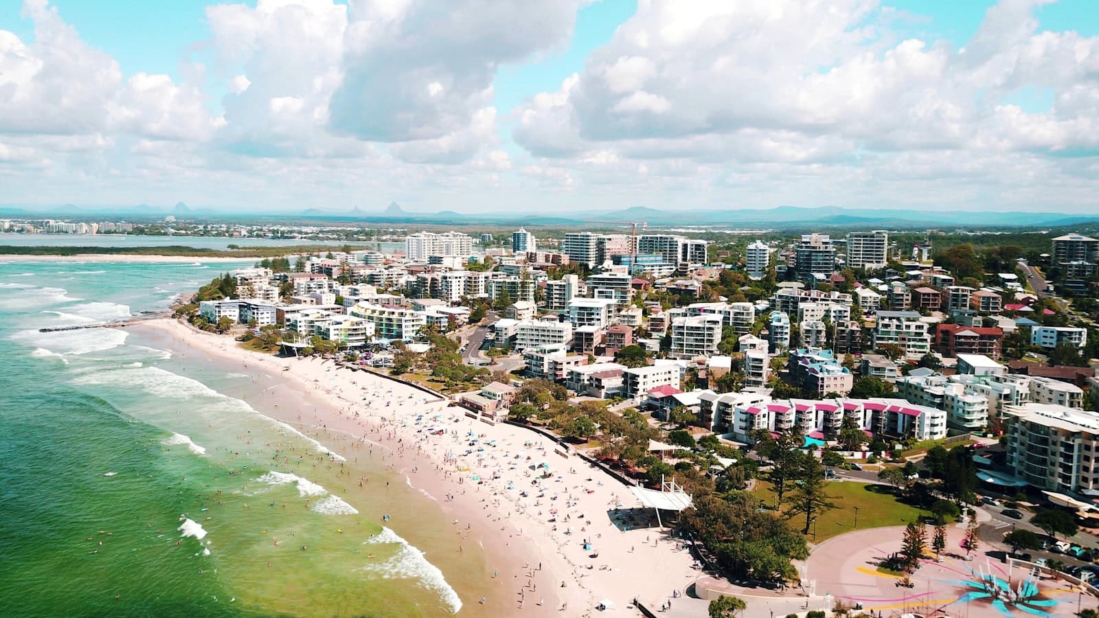 Port Lincoln — city buildings near body of water under white clouds and blue sky during daytime