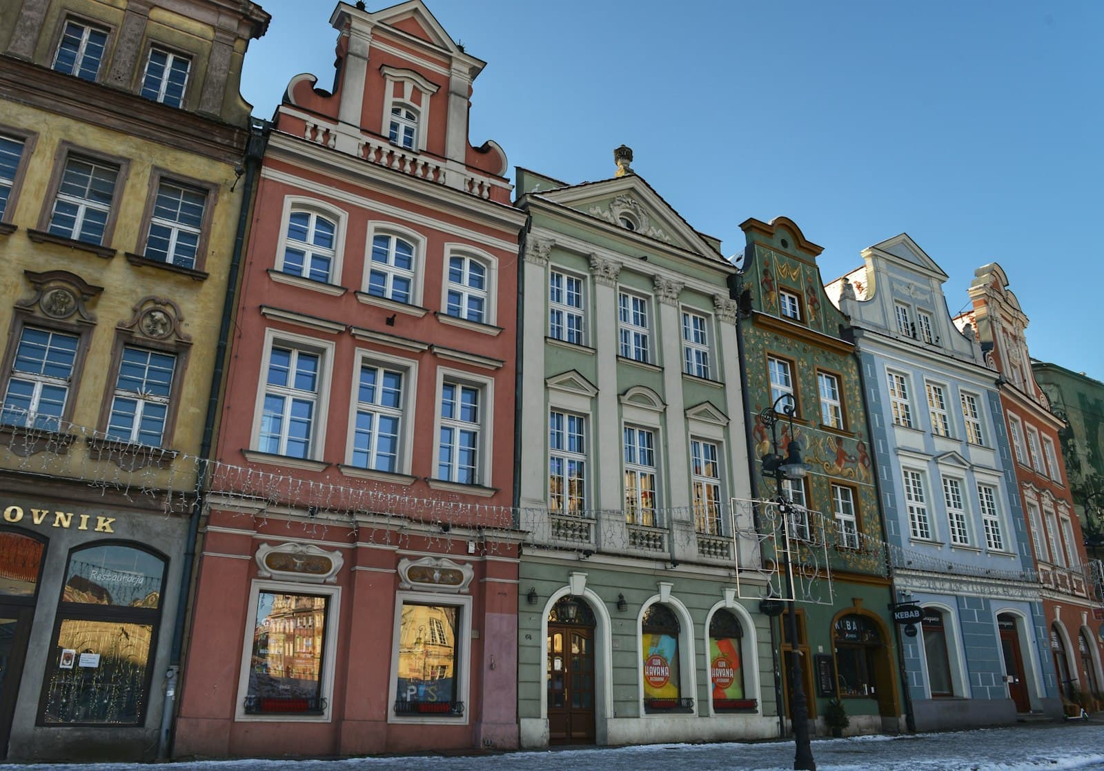 Poznań — a row of old buildings on a city street
