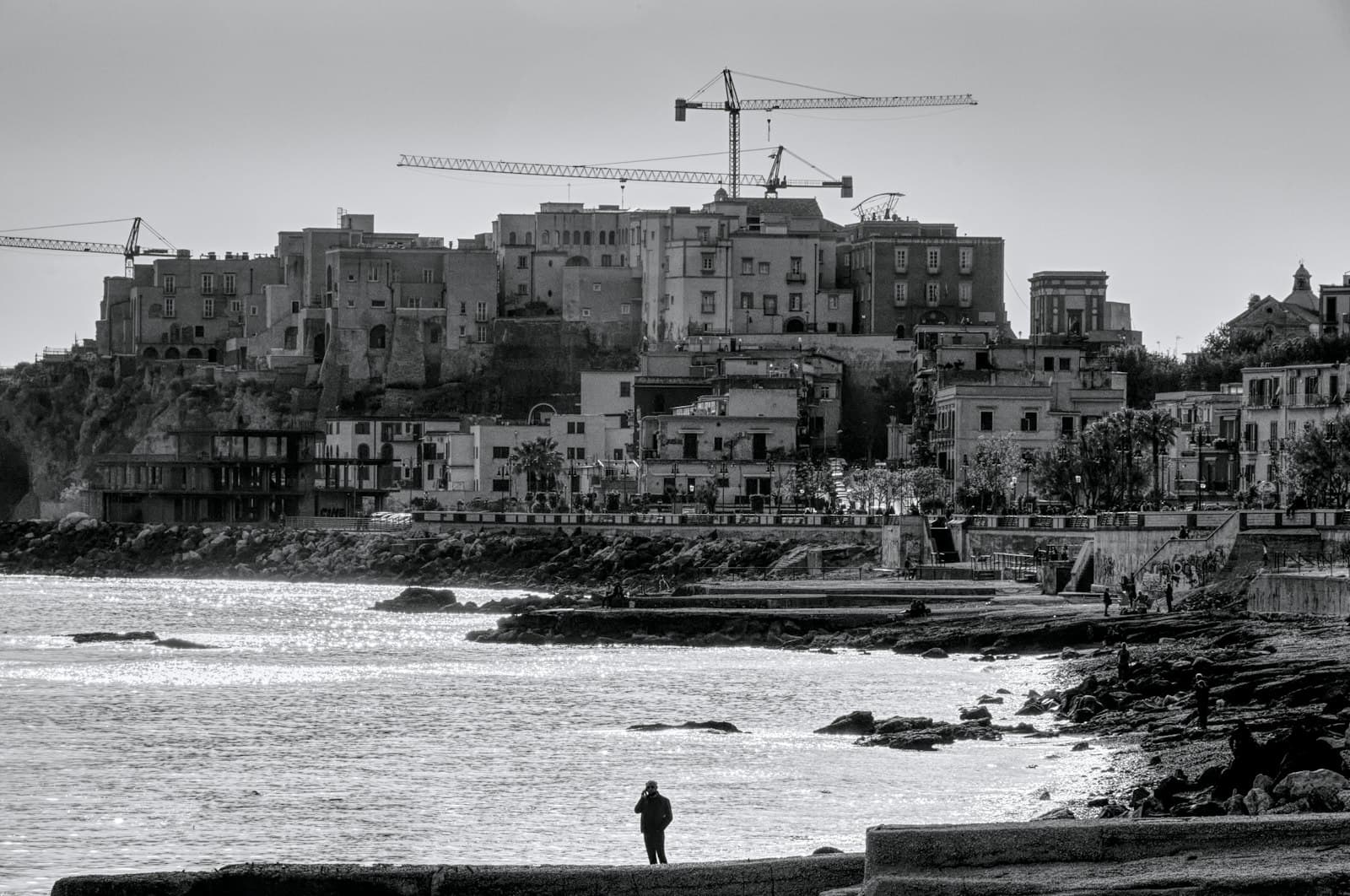 Pozzuoli — a person standing on a beach