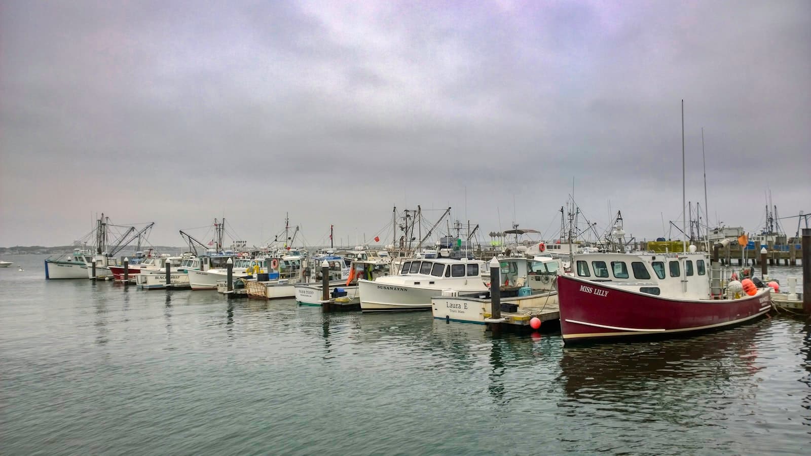 Provincetown — red and white boat on water during daytime