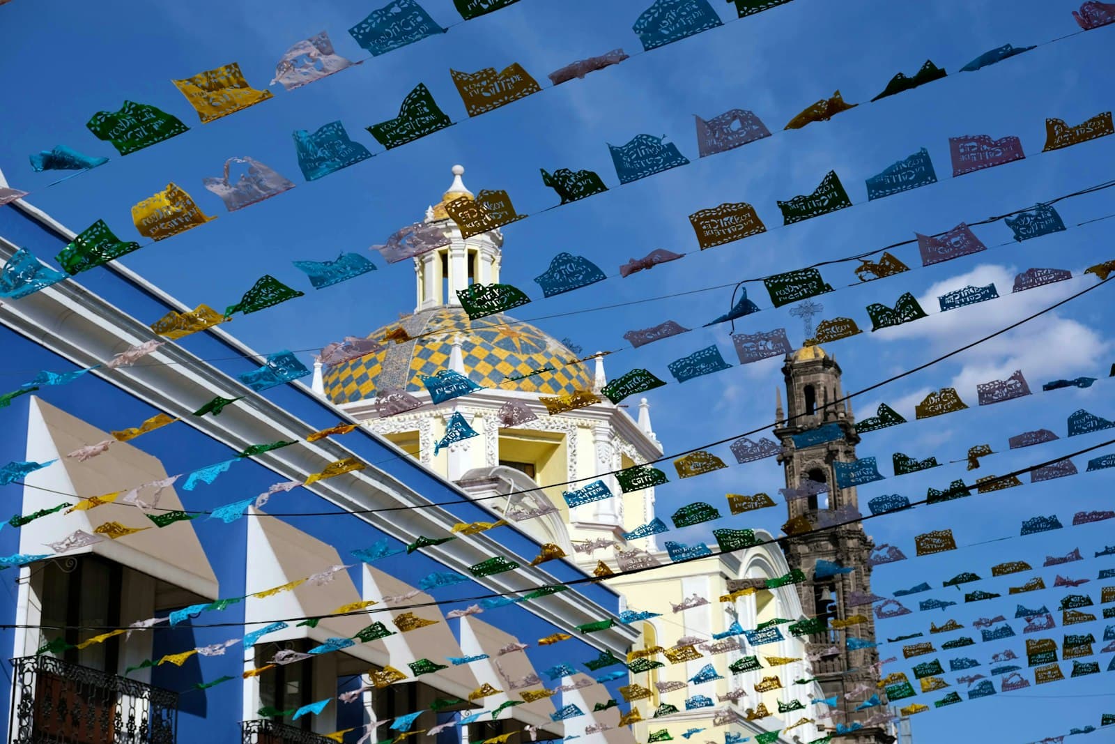 Puebla — a building with many flags flying in the air