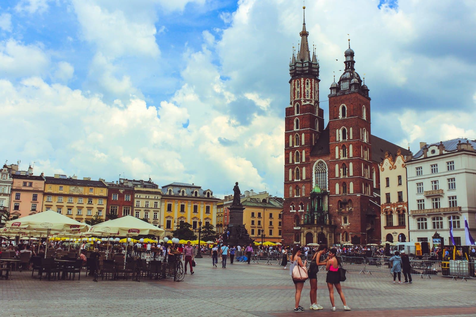 Radom — people walking near canopies in front of buildings during daytime