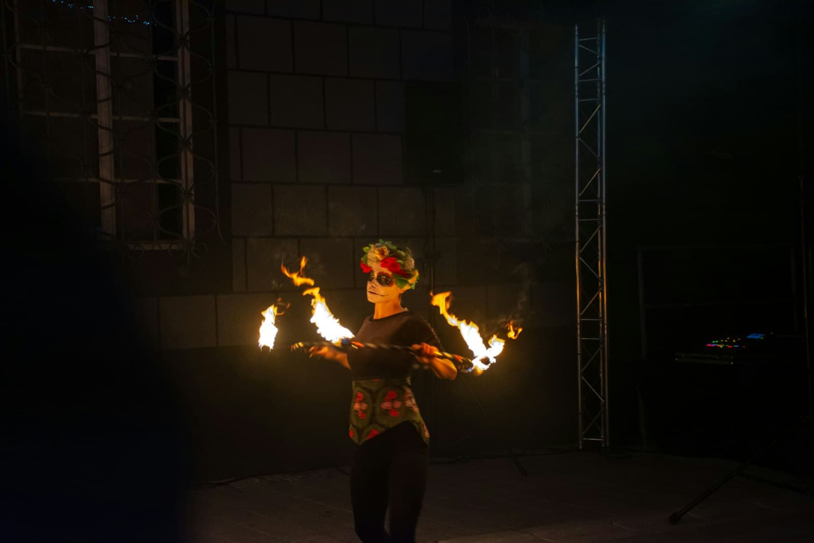 Radovljica — A woman is performing a fire show in the dark