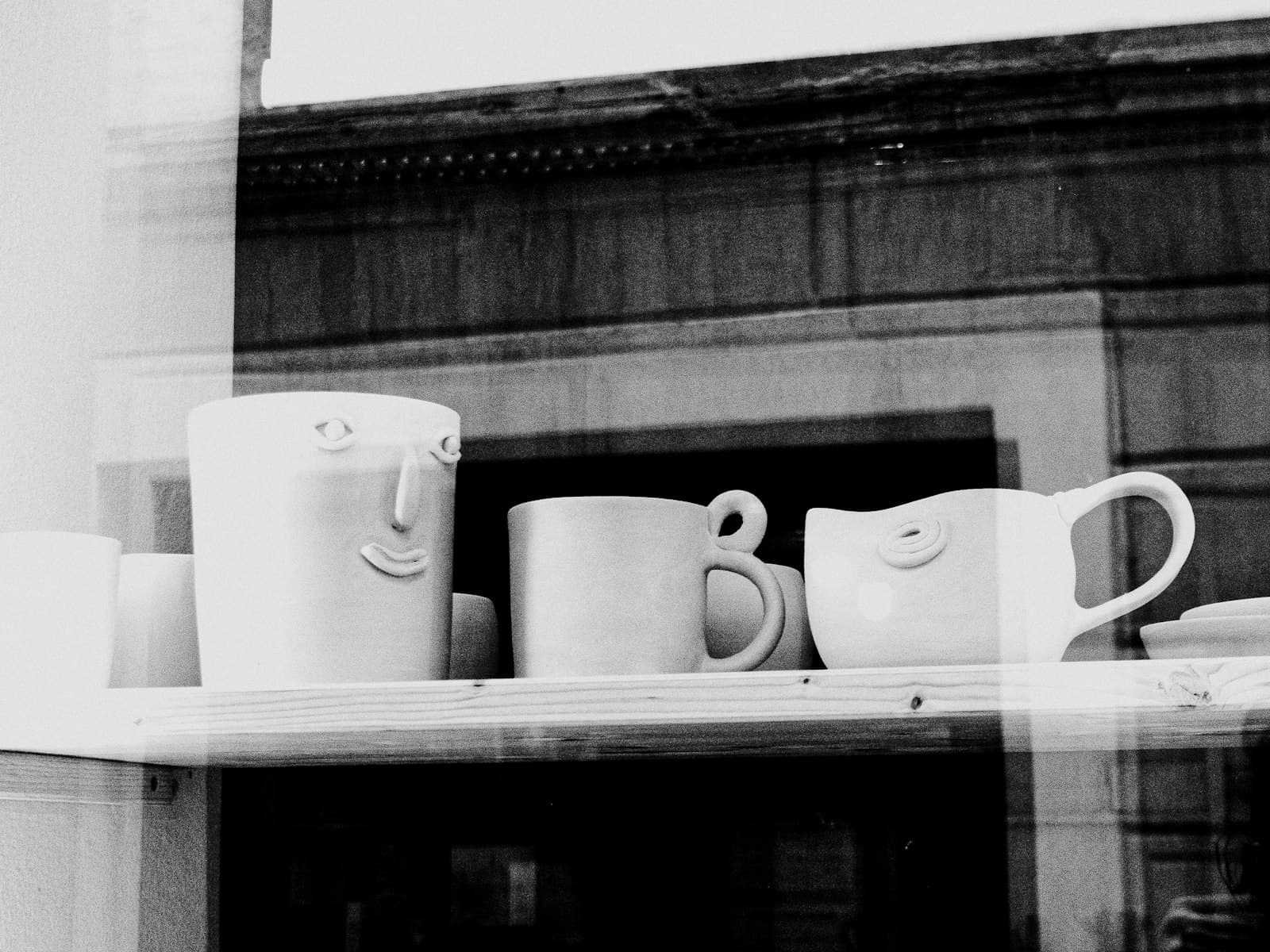 Radovljica — a shelf with coffee cups and mugs on it