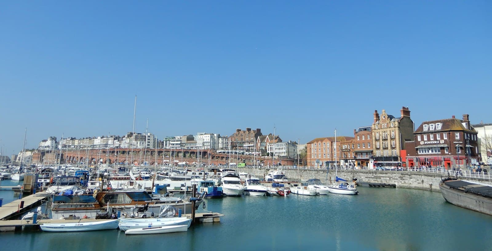Ramsgate — a body of water with boats in it and buildings in the back