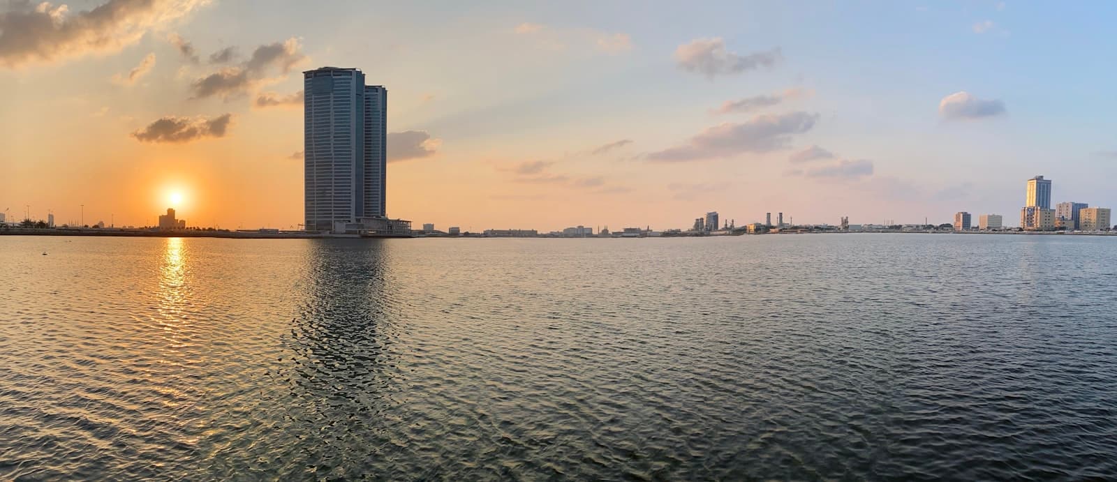 Ras al-Khaimah — city skyline across body of water during daytime